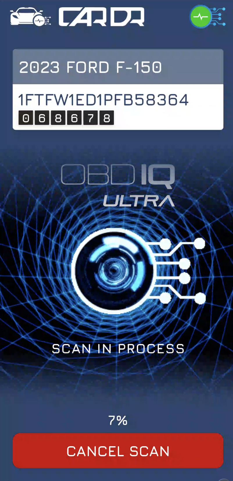 CarDr OBDIQ app mid-scan, reading modules across the vehicle's networks.